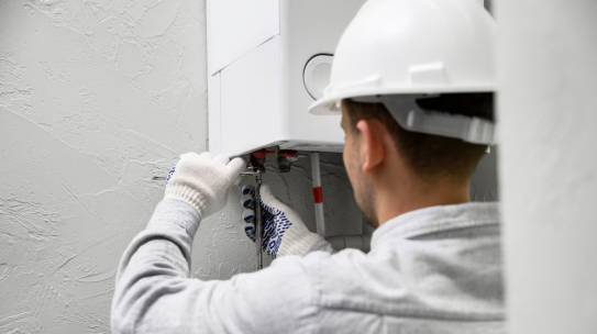 Tankless Water Heater Maintenance in Carrollton, TX: Keep Your System Running Smoothly with AAA AUGER Plumbing Services