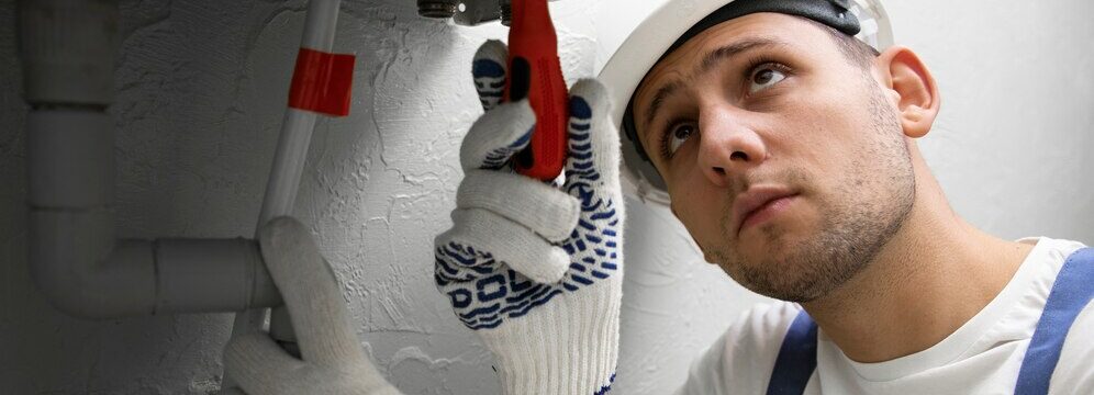 Plumber Repairing Water Heater
