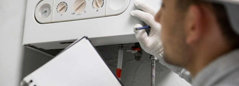 Plumber Repairing Water Heater